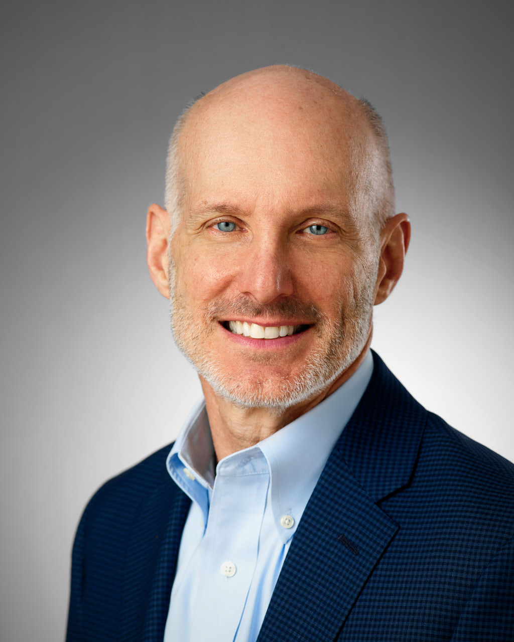 Professional Headshot for Linkedin profile Caucausian man on grey background - Photographer Jared Wolfe in Alexandria VA